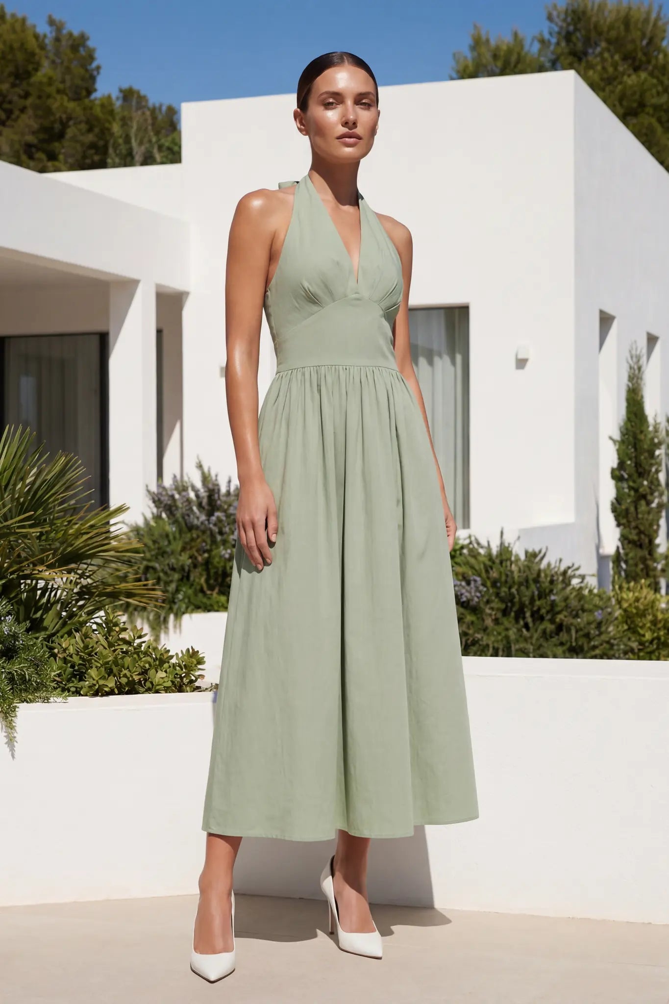 Robe midi dos nu en coton vert à taille structurée