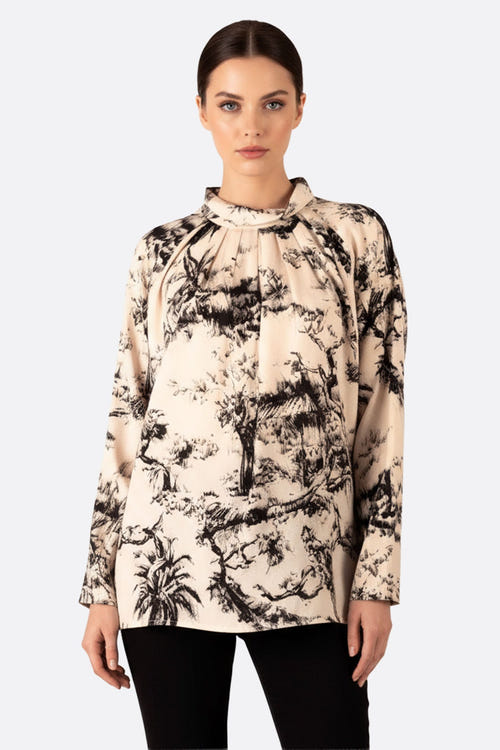 
Blouse oversize en toile de Jouy noir et blanc, offrant une touche d'élégance moderne pour vos tenues de tous les jours.



