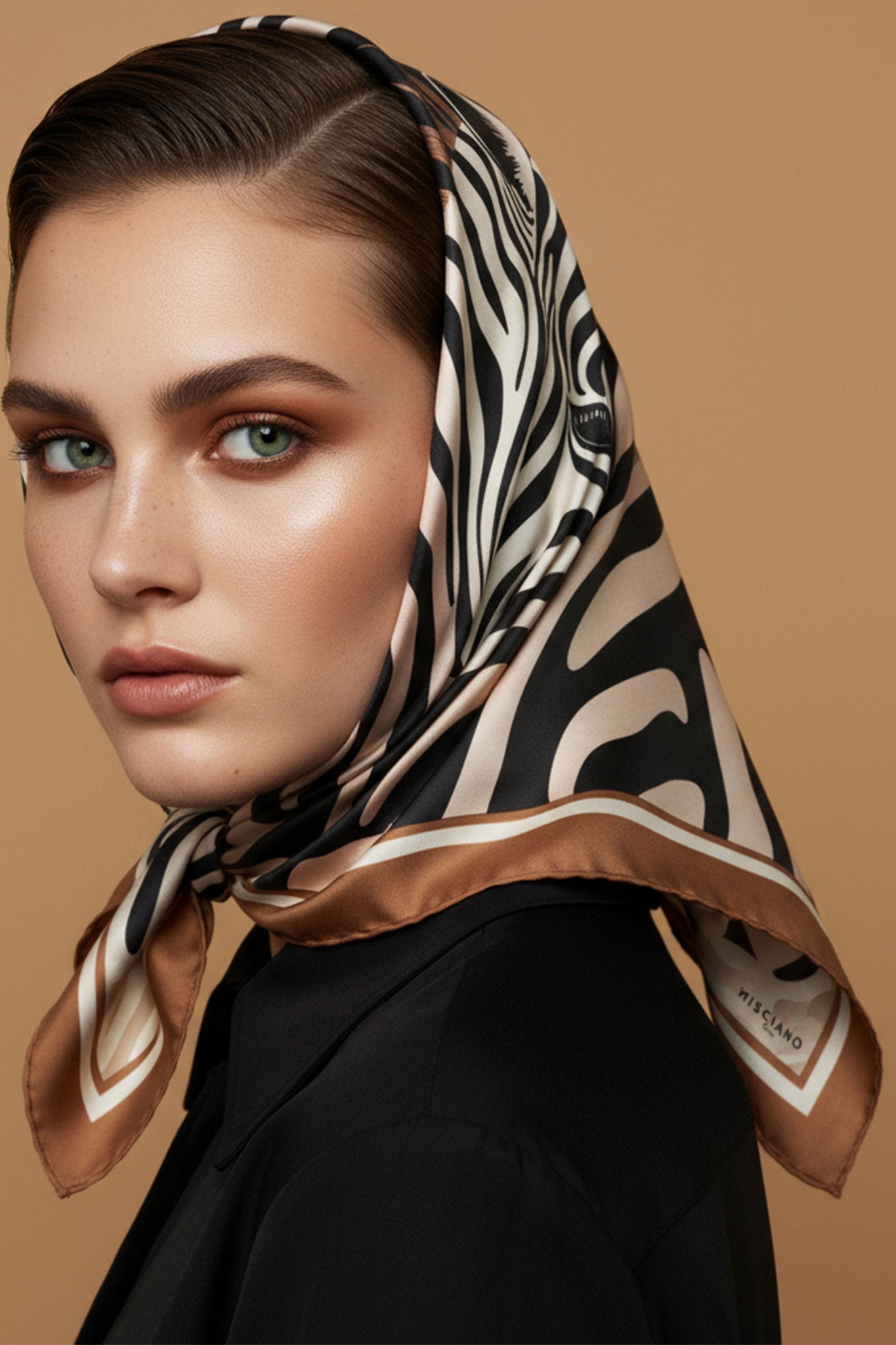 Sophisticated double-sided silk carré with a distinctive zebra design, perfect for enhancing both casual and formal...