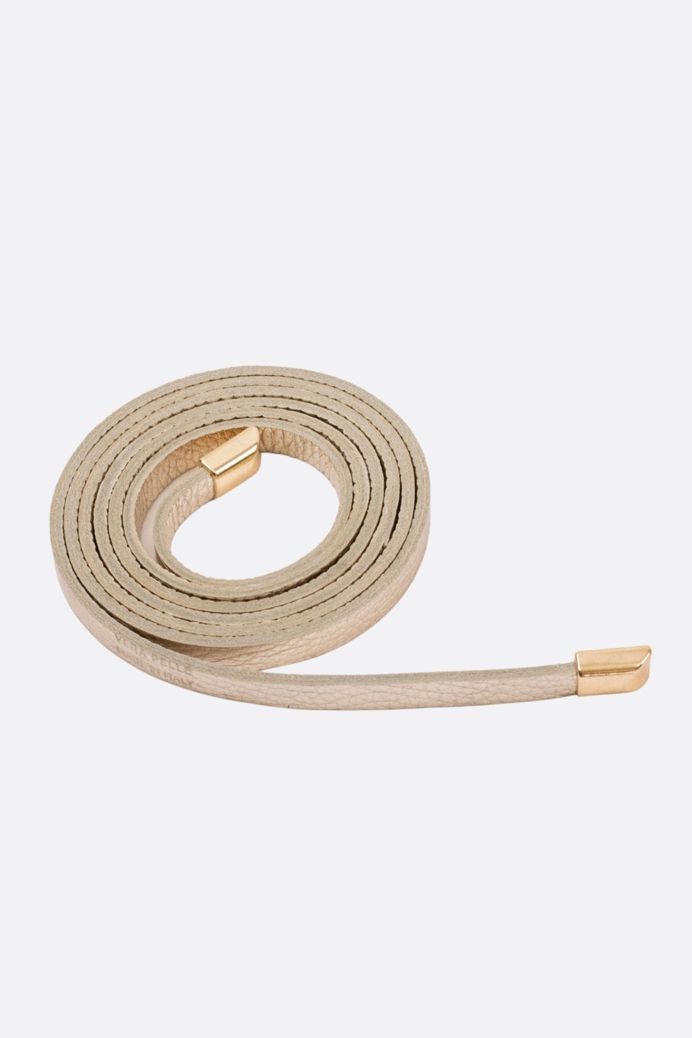 Elegant light gold leather belt with chic metallic accents, perfect for enhancing any sophisticated outfit.