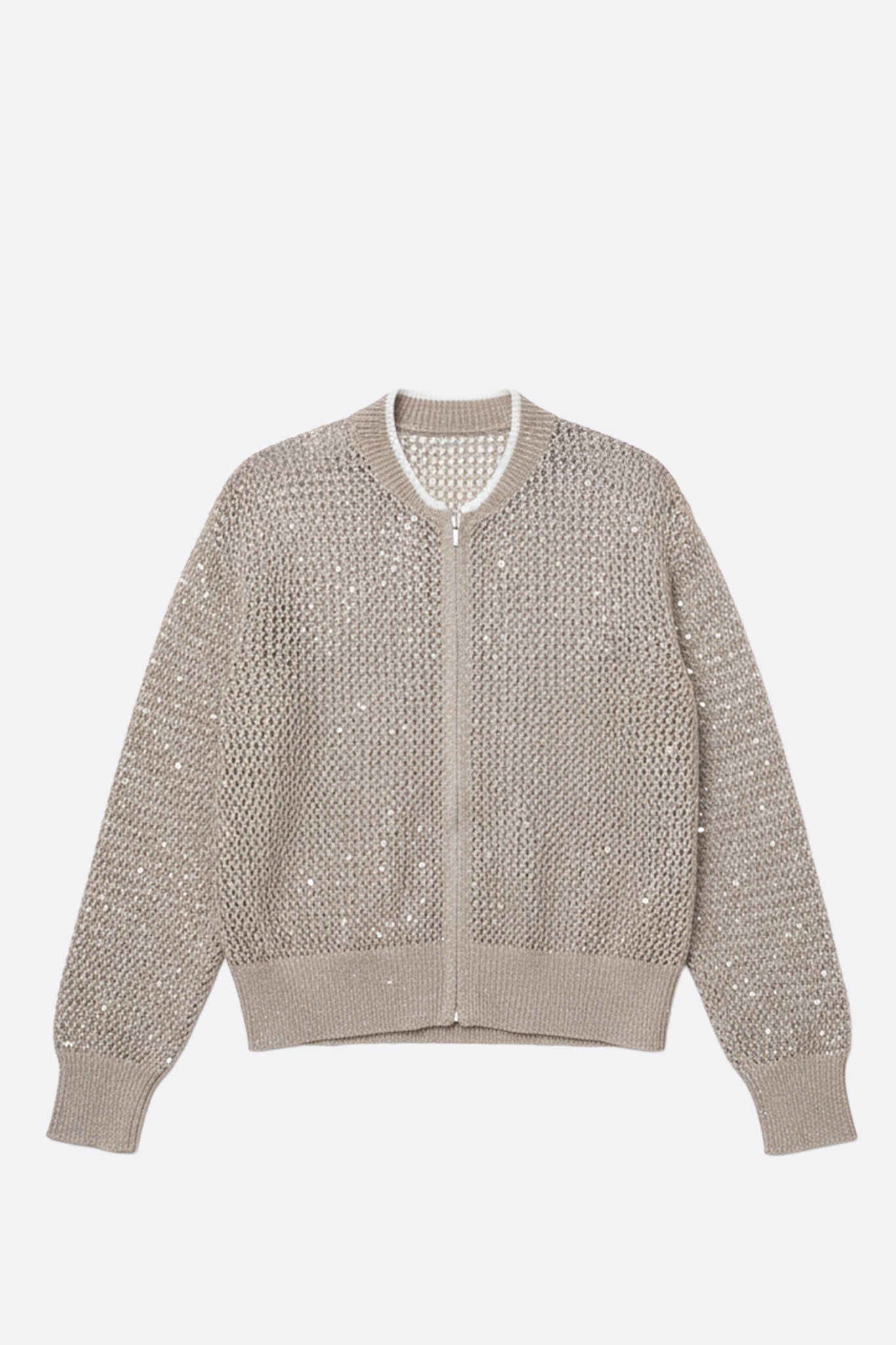 
Détail latéral du gilet beige sable zippé, en coton et tencel ajouré, orné de sequins, idéal pour une tenue chic au...



