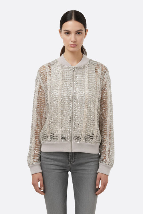 
Gilet bomber ajouré en lin et soie couleur champagne, orné de sequins, parfait pour sublimer une tenue de soirée chic.



