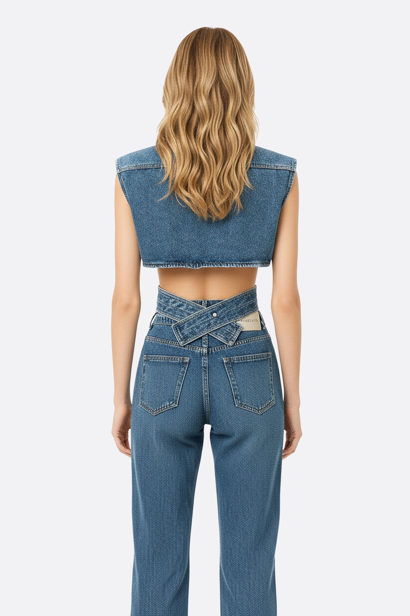 Dettaglio del gilet bustier blu in denim strutturato, evidenziando la texture unica e lo stile elegante per ogni occasione.