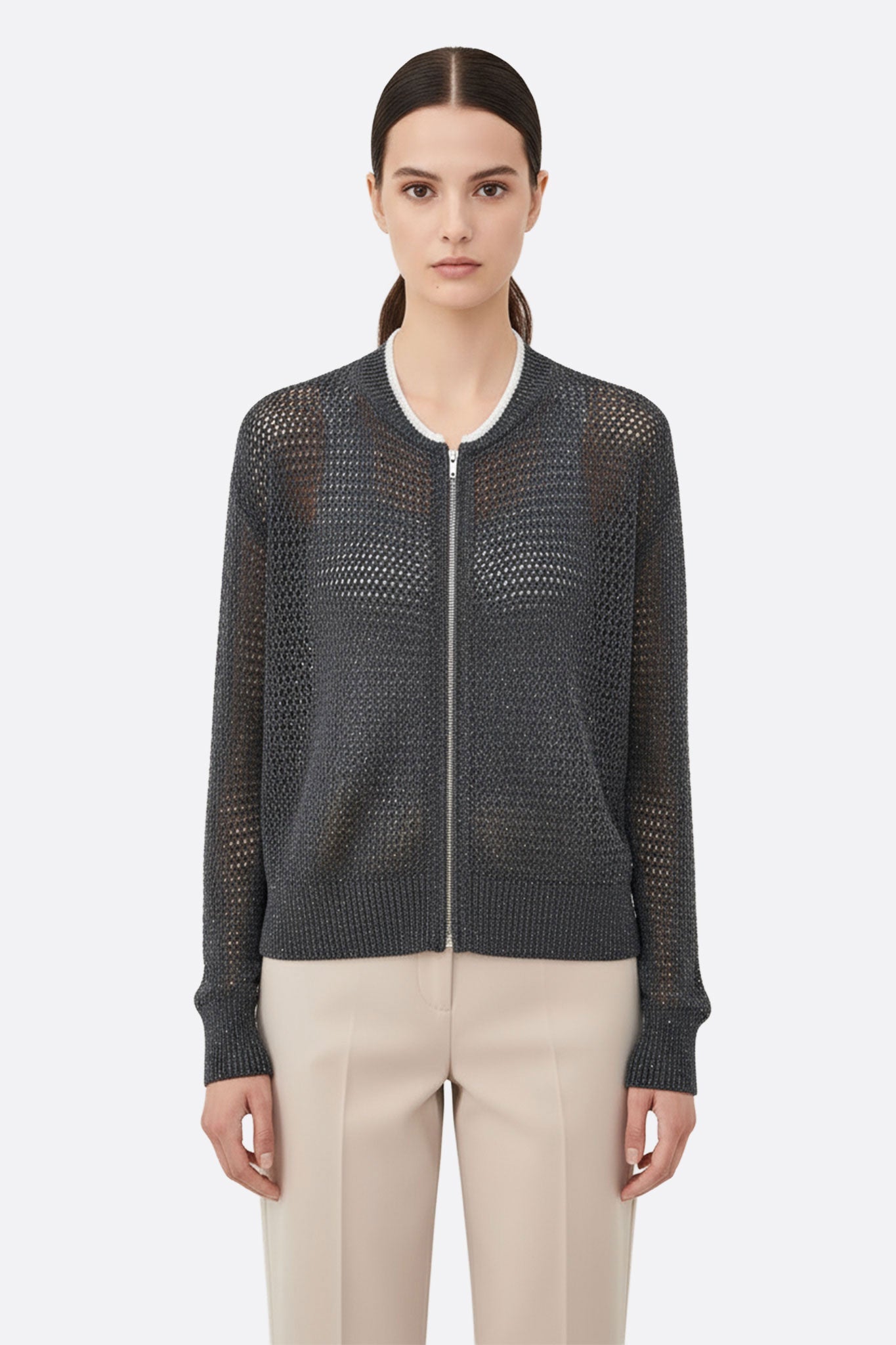 Chaqueta gris de algodón y tencel con diseño ajouré y lentejuelas brillantes, ideal para un look elegante en ocasiones...