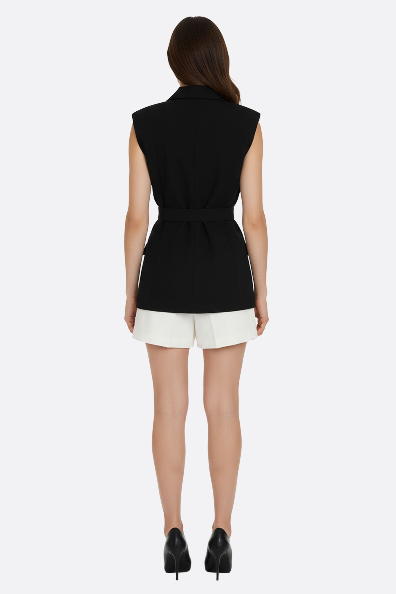 Gilet tailleur sans manches à ceinture structurante, coupe croisée en tissu élégant, idéal pour une tenue sophistiquée au...