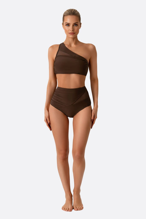 
Maillot de bain deux pièces marron à coupe asymétrique, chic et moderne, parfait pour des journées ensoleillées à la plage.



