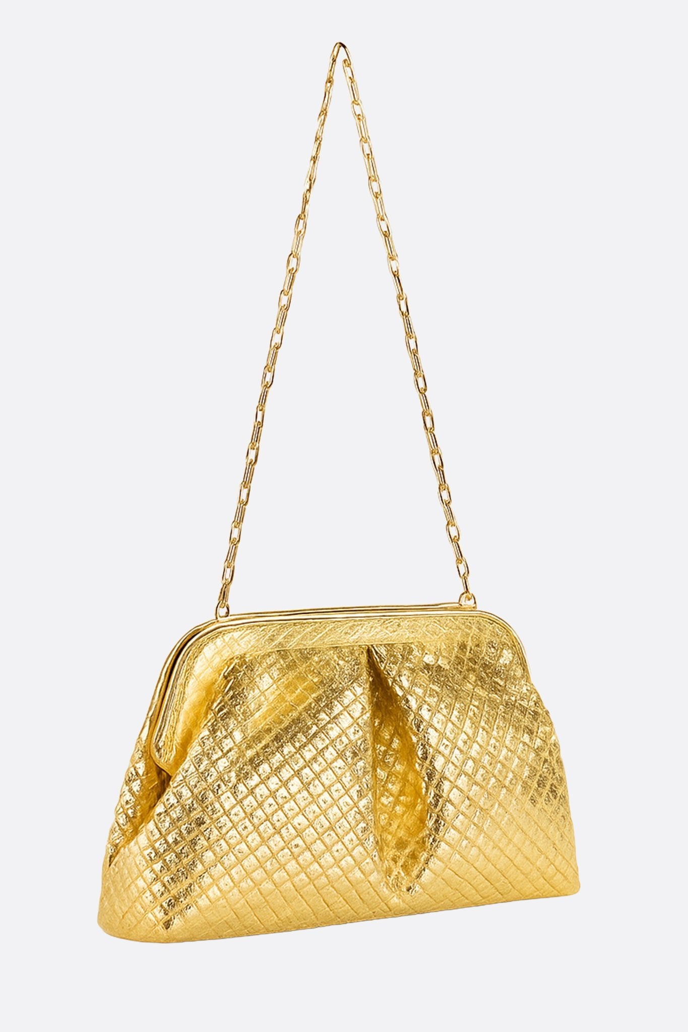 
Zoom sur la texture tissée d'une pochette dorée en PU, un accessoire chic pour vos sorties nocturnes élégantes.



