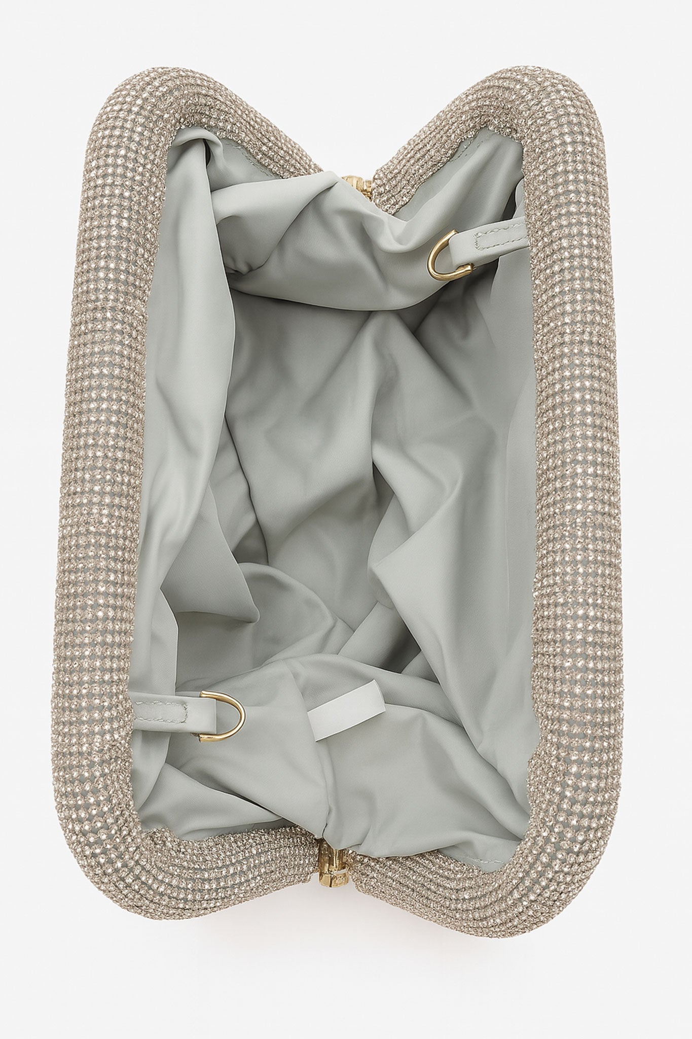 Stylish 3/4 angle of a silver-copper crystal gradient evening clutch, showcasing its elegant design for special events.