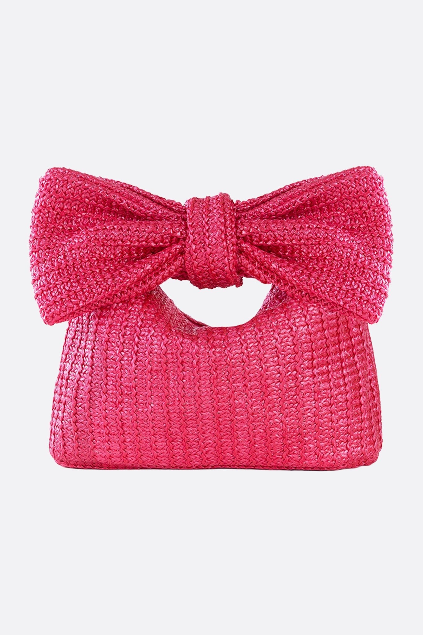 Pochette en paille tressée rose fuchsia, accessoire élégant pour apporter une touche estivale à vos tenues.