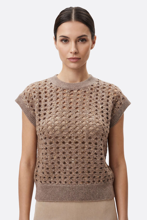 
Pull ajouré sans manches en gris taupe, orné de sequins éclatants, idéal pour une soirée ou une tenue chic au bureau.



