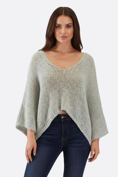 
Pull ample turquoise en maille ajourée, style décontracté chic, parfait pour les journées ensoleillées.



