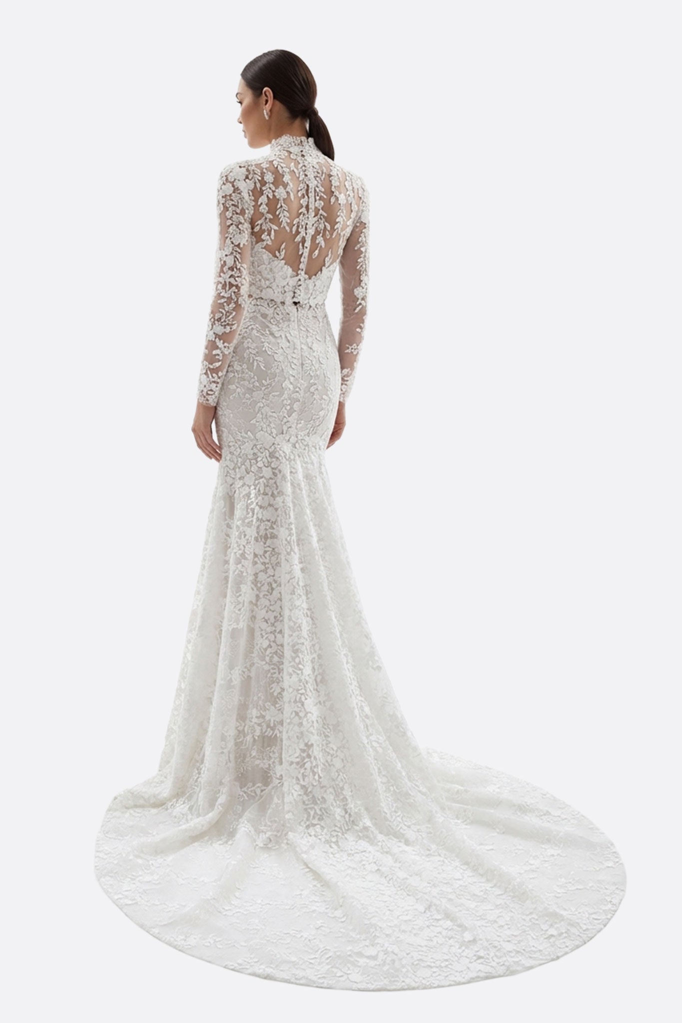 
Manches longues en dentelle d'une robe de mariée sirène blanche, détail chic pour un jour de fête inoubliable.



