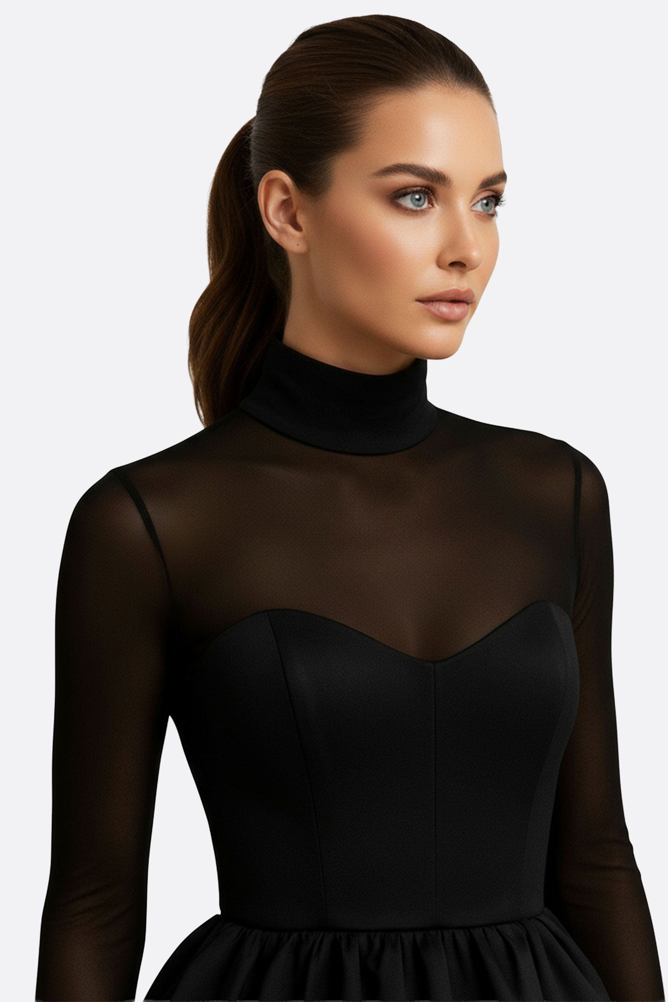 Détail de la robe noire bouffante à manches en tulle, mettant en valeur sa texture délicate et son élégance subtile pour...