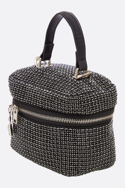 
Zoom sur le sac à main de soirée orné de cristaux noirs, chic et raffiné, idéal pour illuminer vos tenues de gala.



