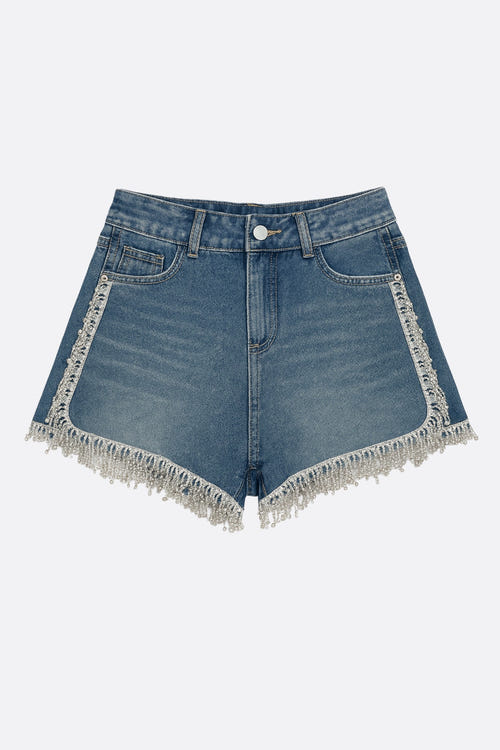 
Short en denim bleu décoré de strass scintillants, parfait pour une sortie élégante ou décontractée.



