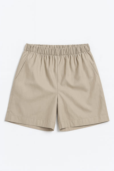 
Short beige à taille élastique, en tissu léger, parfait pour un look estival chic et décontracté lors des journées...



