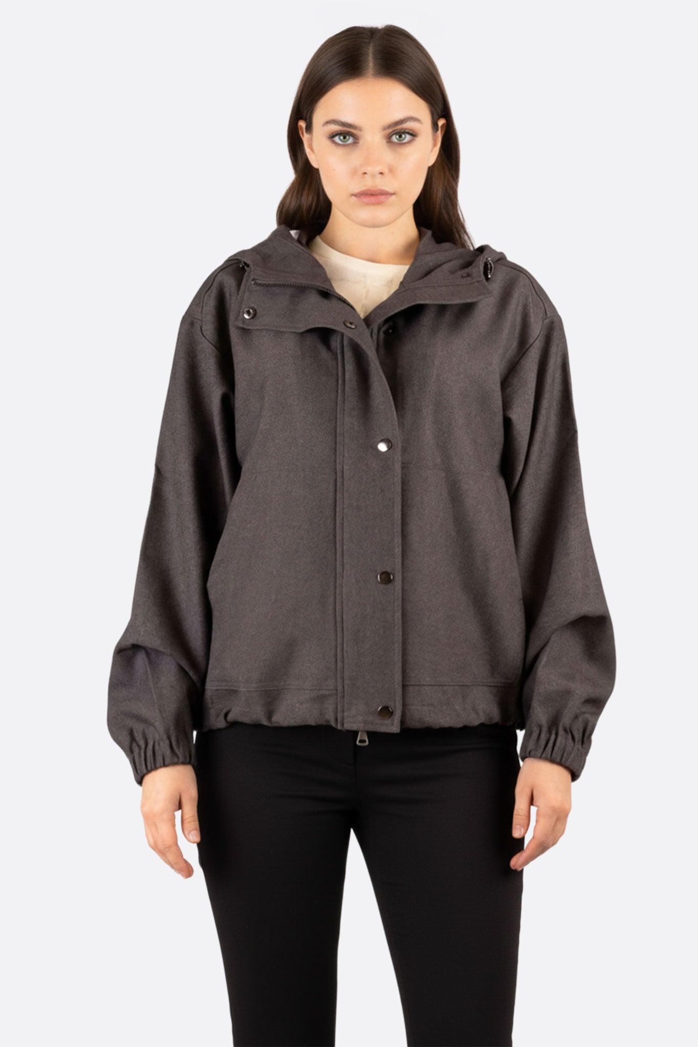 Chic anthracite windbreaker jacket for women, perfect for casual outings or sporty activities.