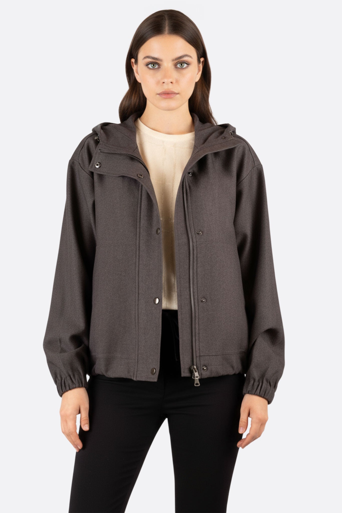 Side view of a sleek anthracite windbreaker in lightweight fabric, ideal for elegant outdoor adventures or daily wear.