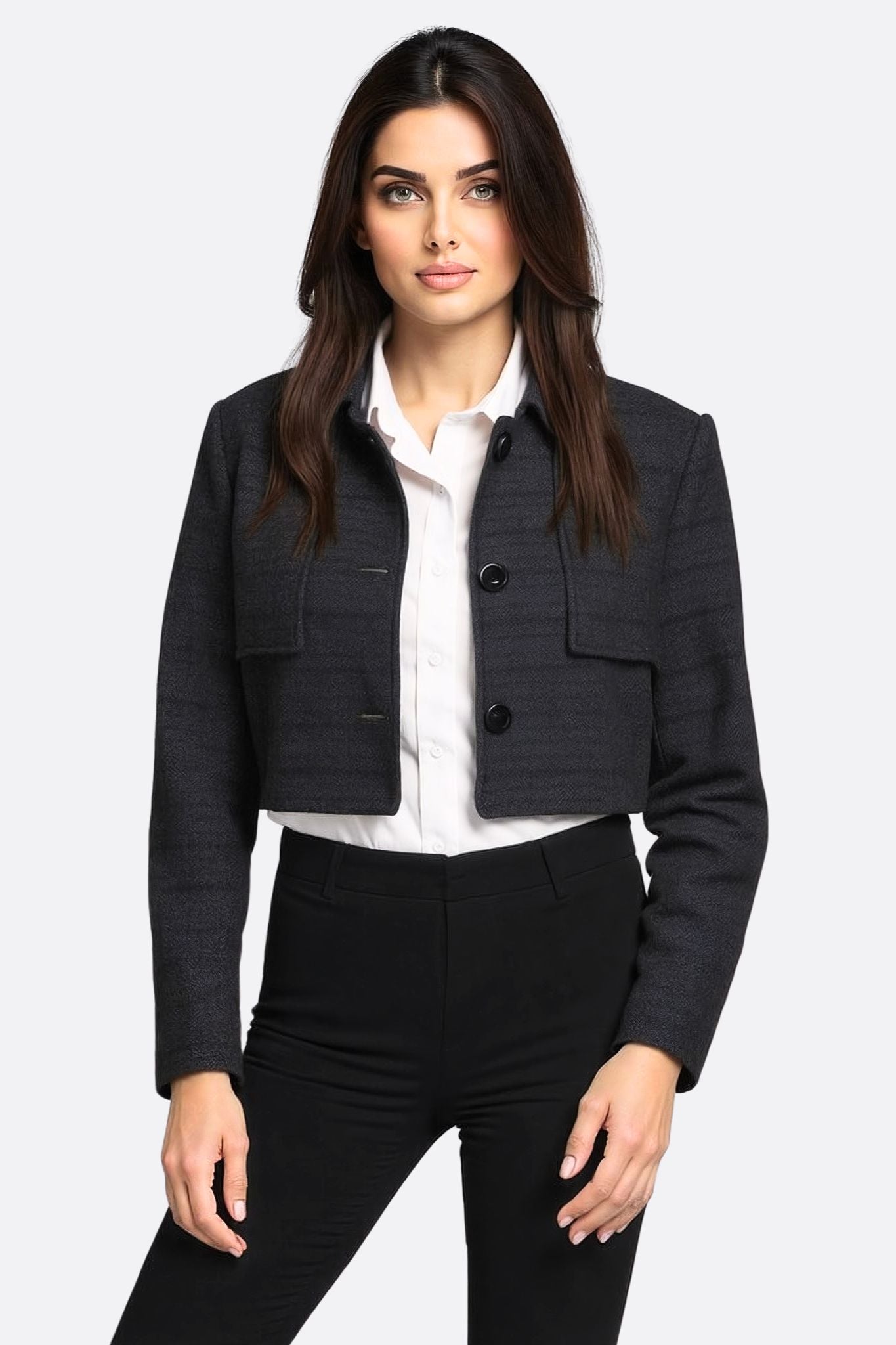 Chic black tweed cropped jacket with satin lining, designed to enhance the waist and create a sleek silhouette for...