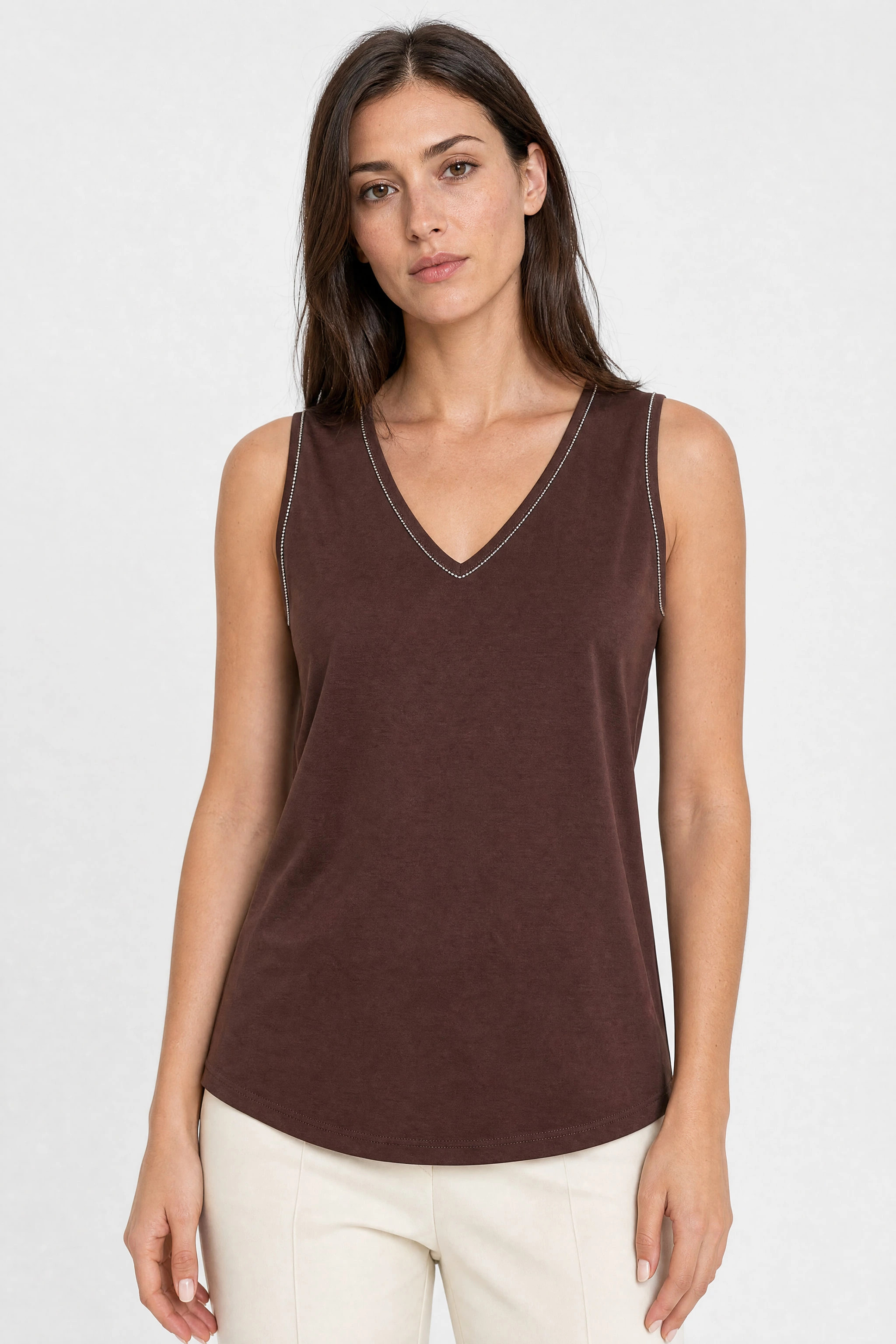 Close-up of the beaded V neckline and armhole of the cotton and silk tank top