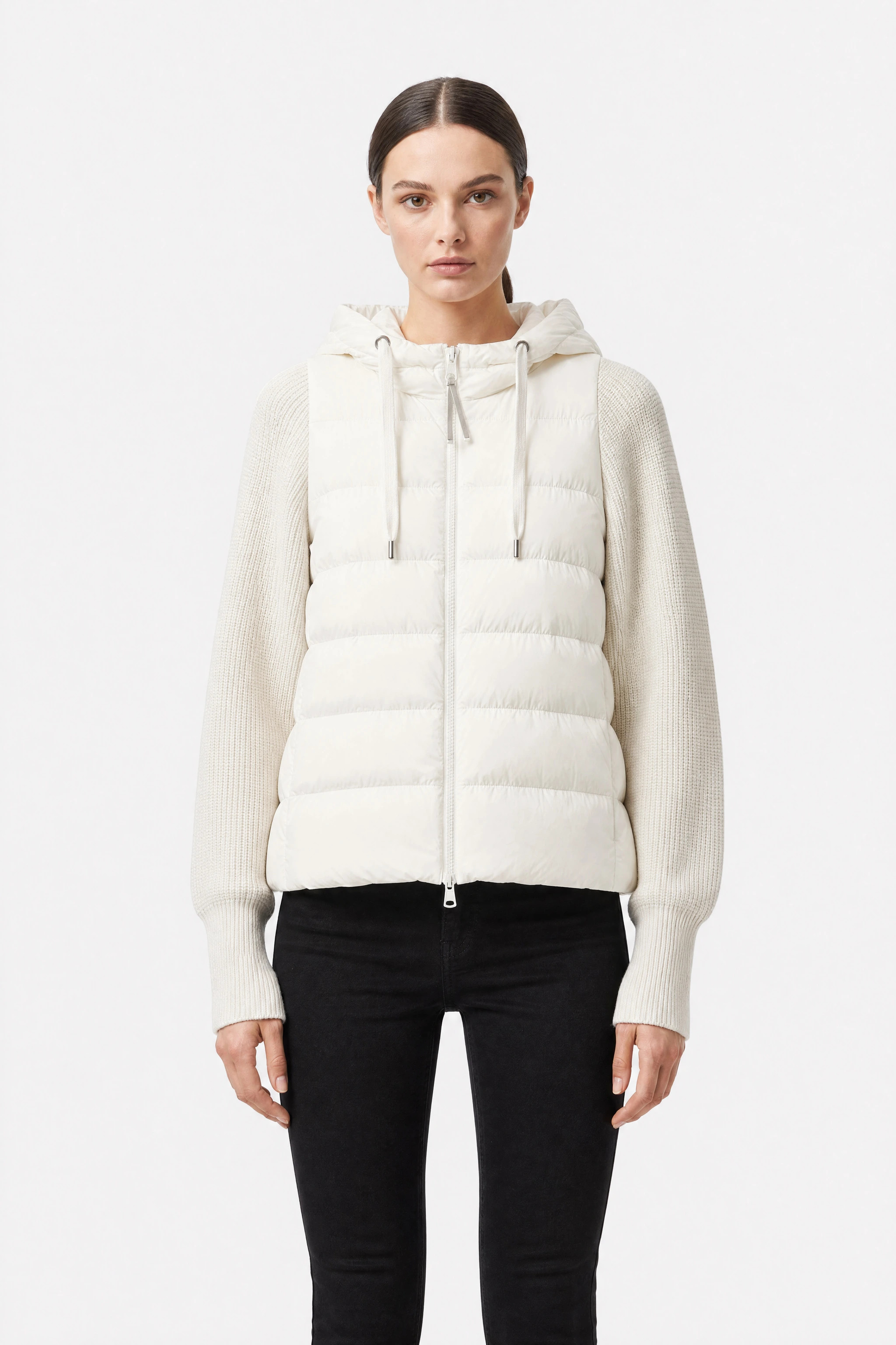 White bi-material down jacket with duck down and hood, close-up