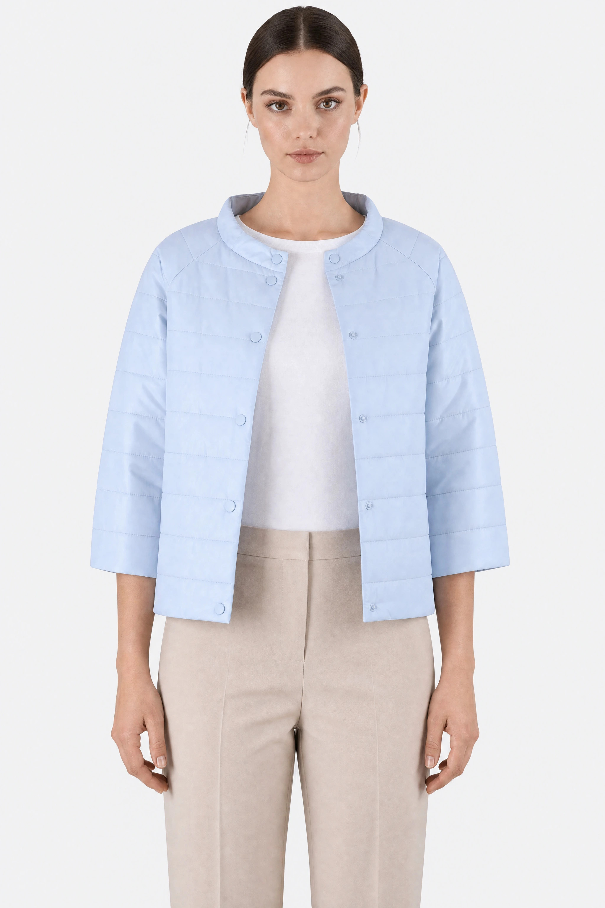 Light blue sky down jacket with 3/4 sleeves, close-up