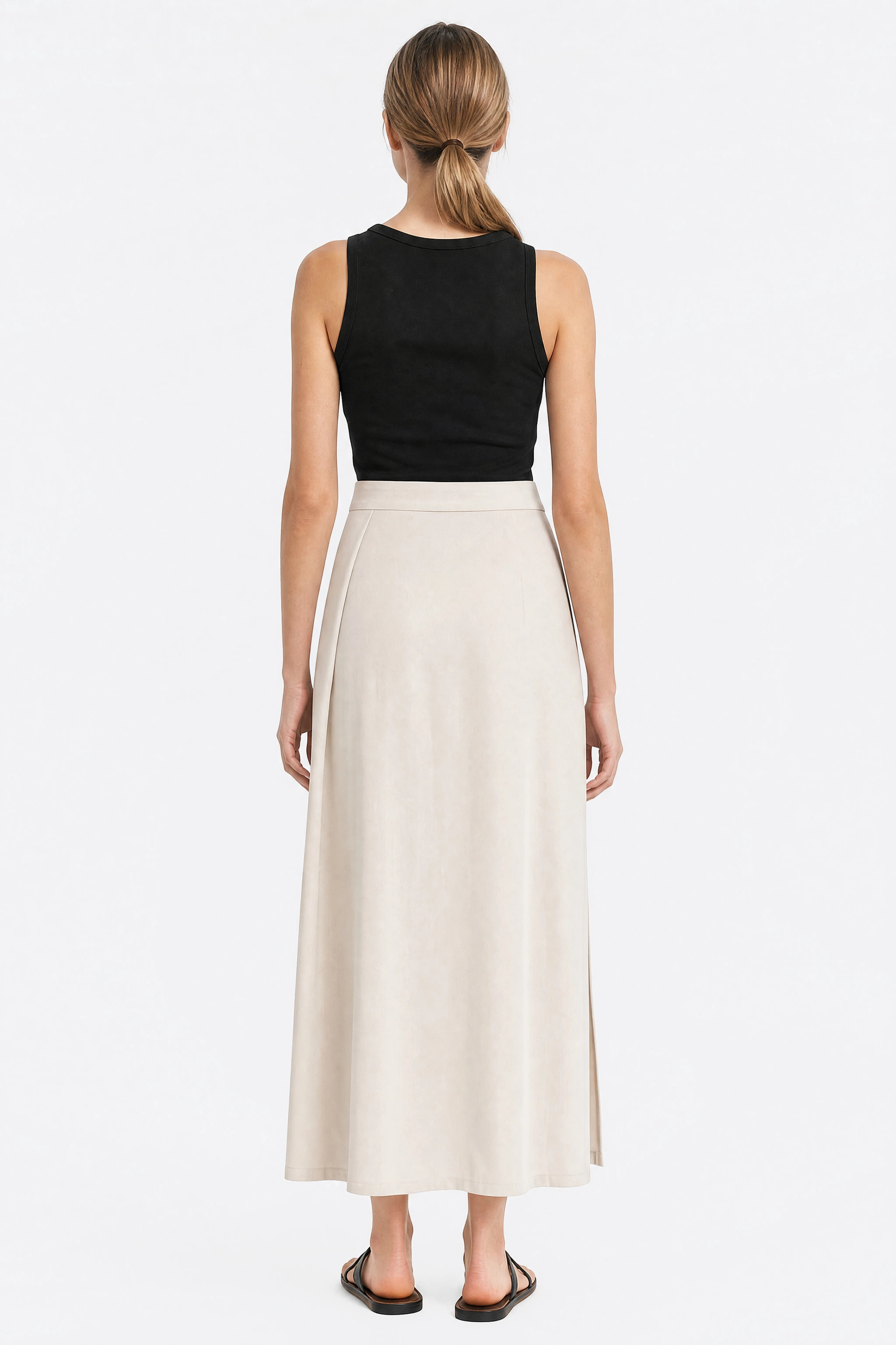 Back of the long ivory viscose skirt, closed back panel and horizontal inserts