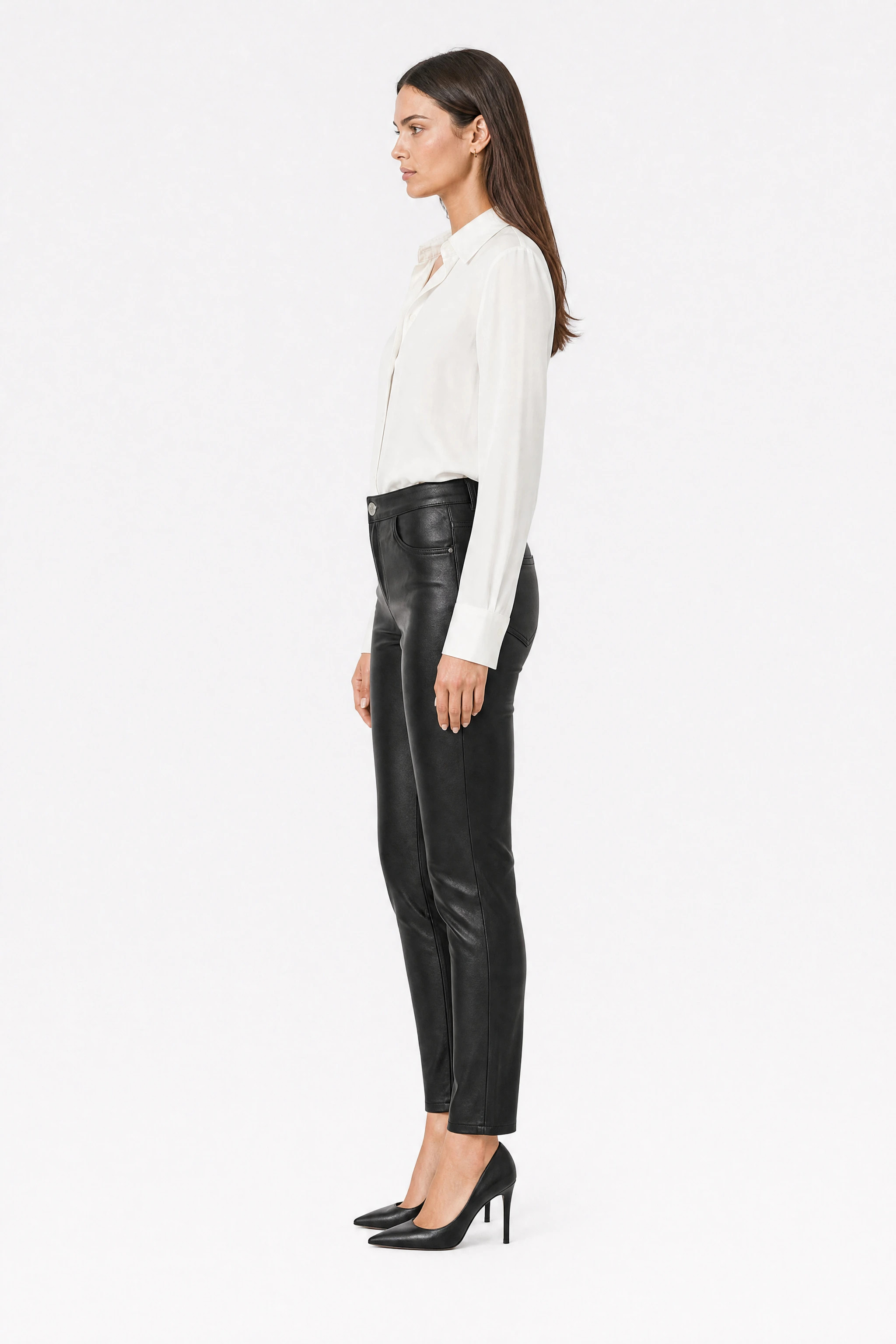 Black faux leather trousers, side view