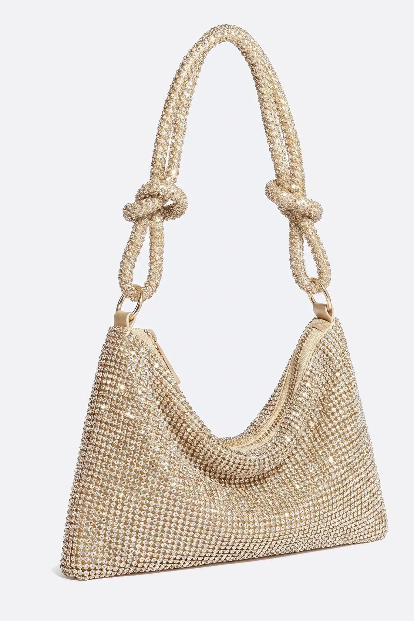 Pochette in strass dorata vista di tre quarti, manico doppio annodato